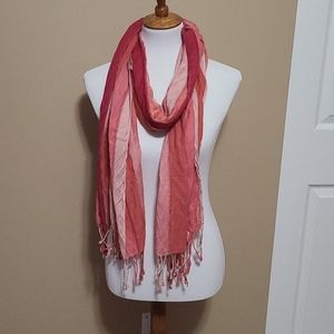 Scarf multiple shades of pink.